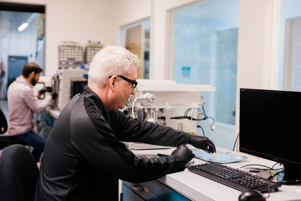 A professional conducting performance monitoring.